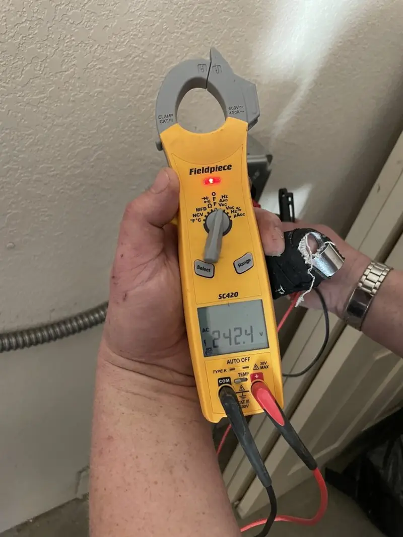 Voltage testing with clamp meter during Generator Installation in Acushnet